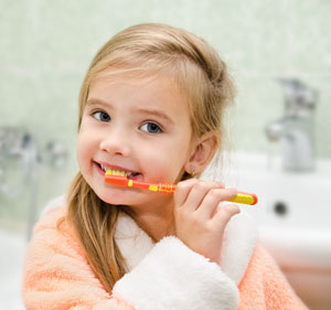 Pediatric Dentist - Brushing Teeth